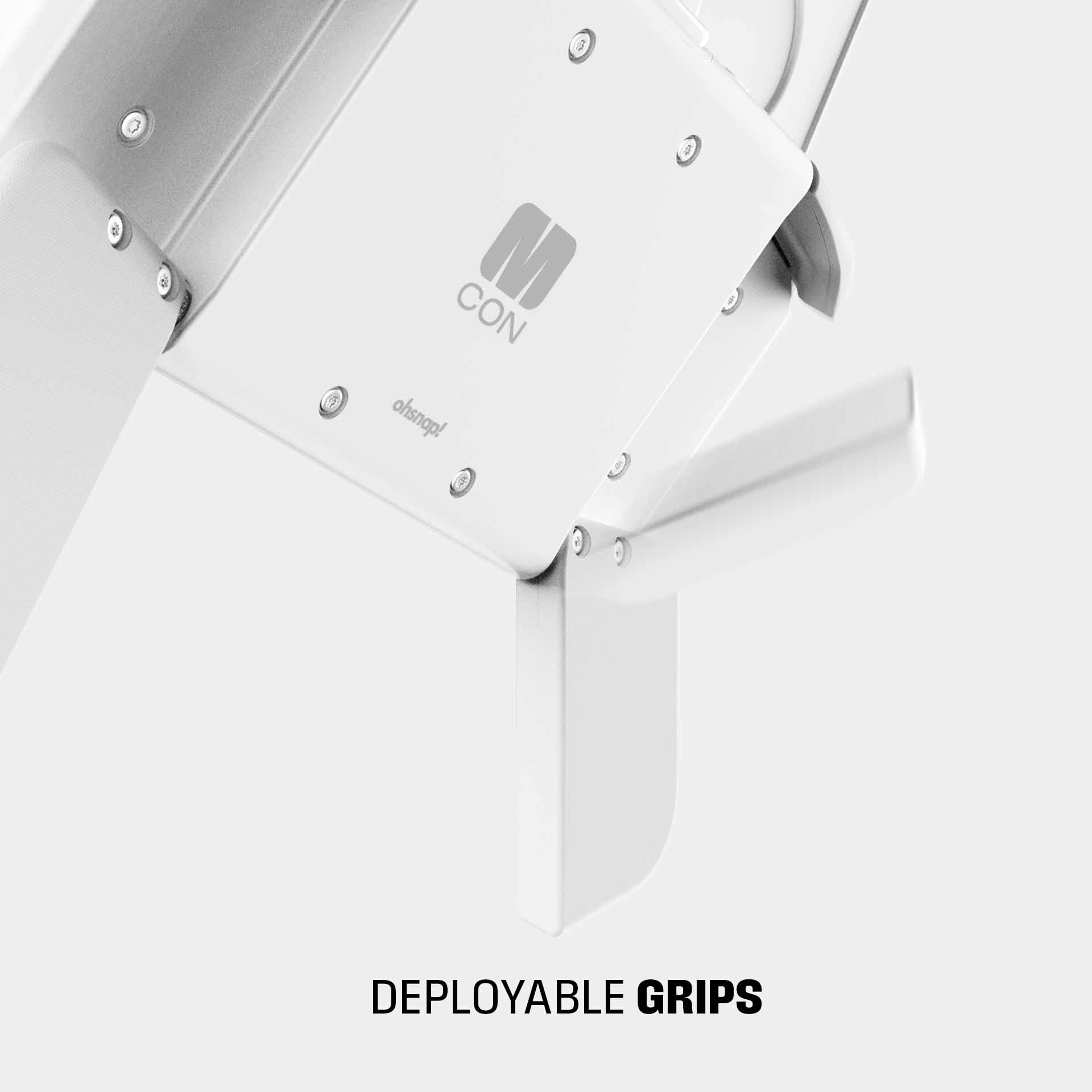 Close-up of a white device featuring deployable grips and a logo with the letters "M CON."
