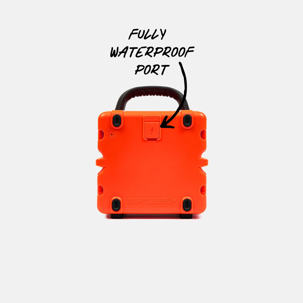 Orange portable device with a handle labeled 'Fully Waterproof Port' on a white background #base-color_orange